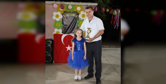 Köyceğiz muhtarından zeka oyunları finalisti öğrenciye gurur dolu ödül